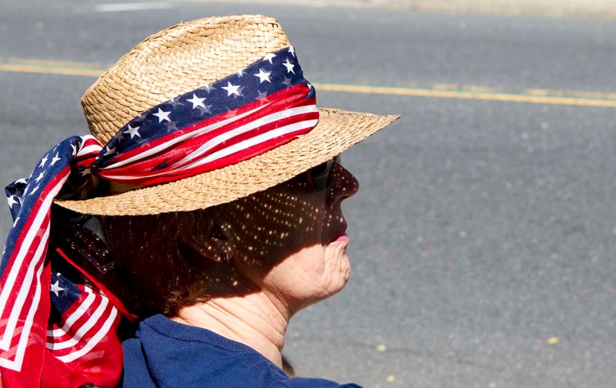 A woman waits for the Memorial Day Parade to start in Freehold, New Jersey on Monday morning. (ARIELLE BERGER | PHOTO EDITOR)